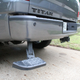 The fold-out step gets pretty dusty tucked under the truck, but it does the job.